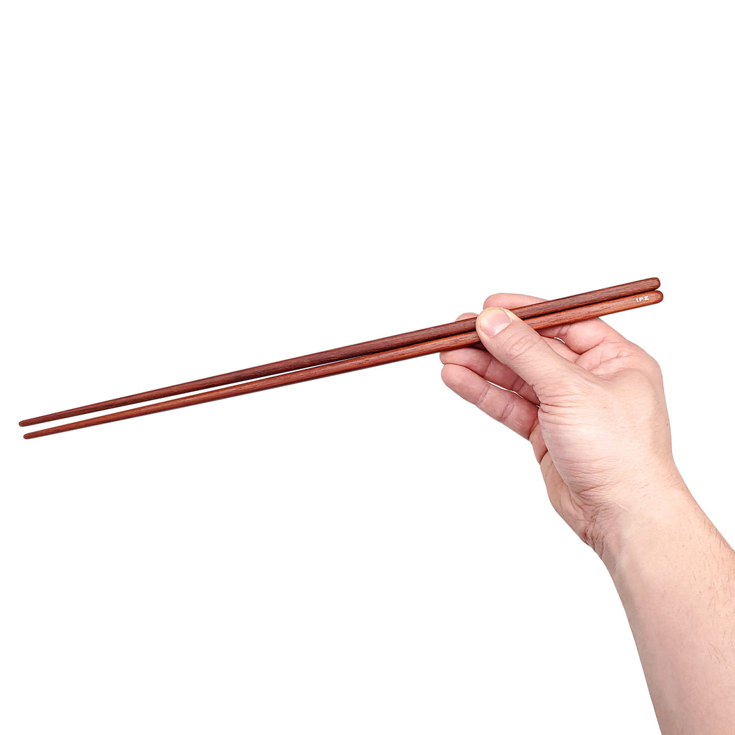 Ipe brown cooking Chopsticks. Full image hand. Custom personalized engraving shown